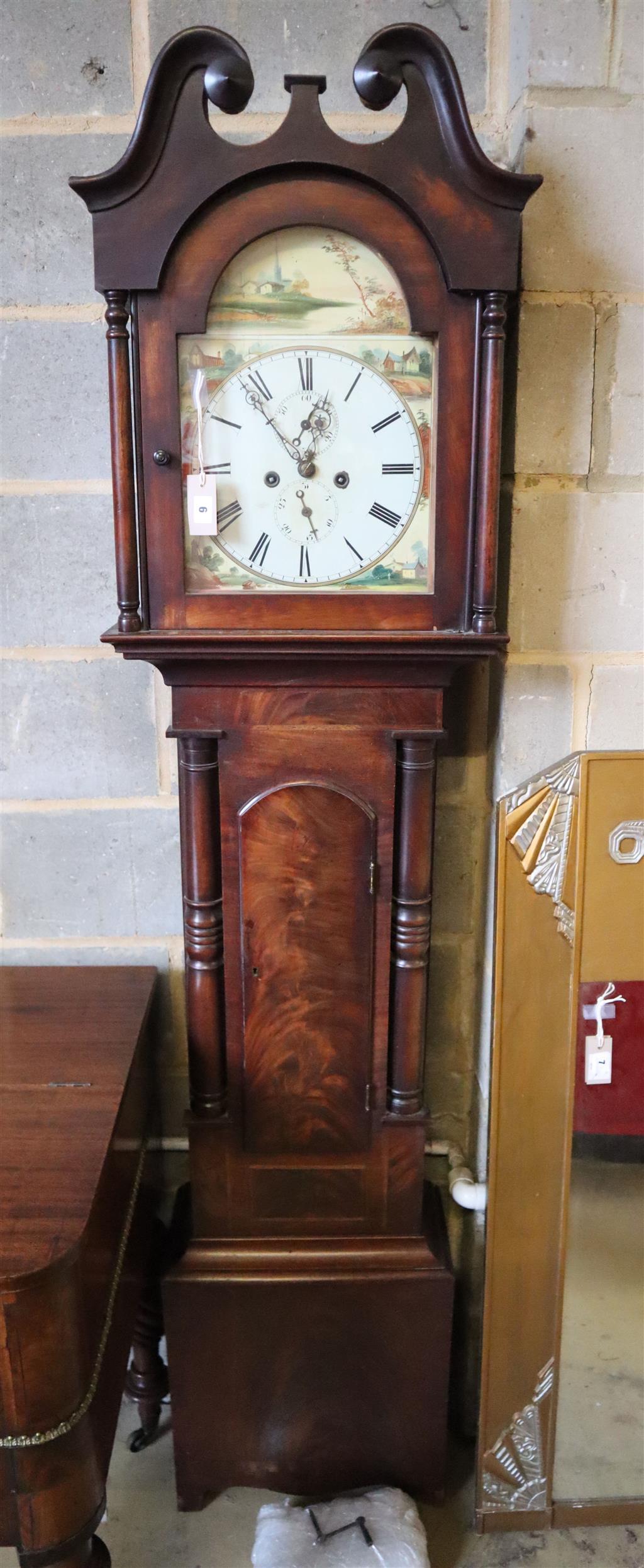 An early 19th century mahogany eight day longcase clock, height 208cm